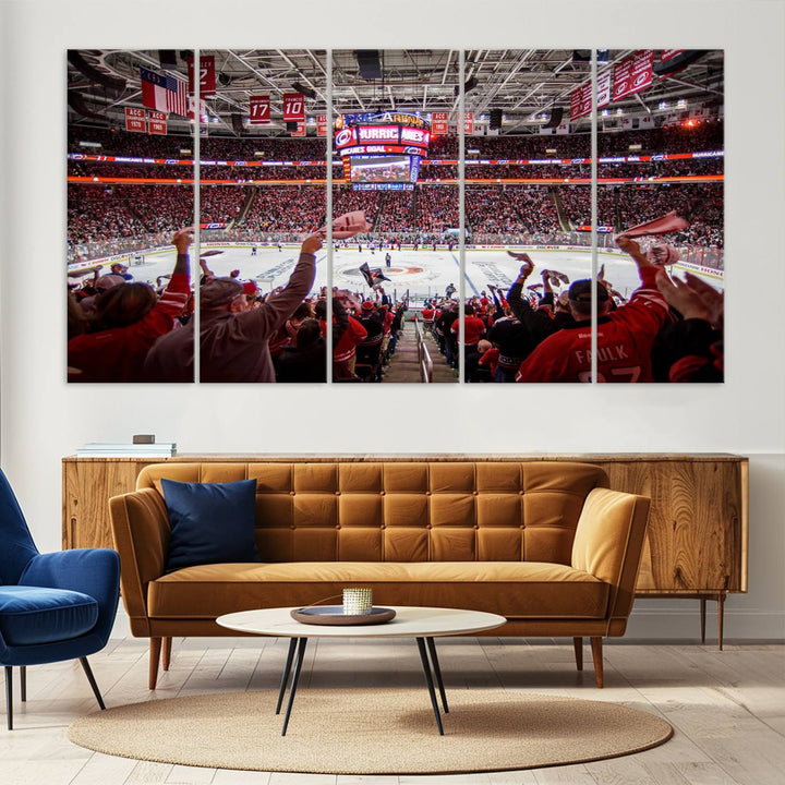 A museum-quality canvas print captures the excitement of hockey enthusiasts cheering in a bustling arena. This artwork provides a vibrant depiction of the Carolina Hurricanes Ice Hockey Stadium.