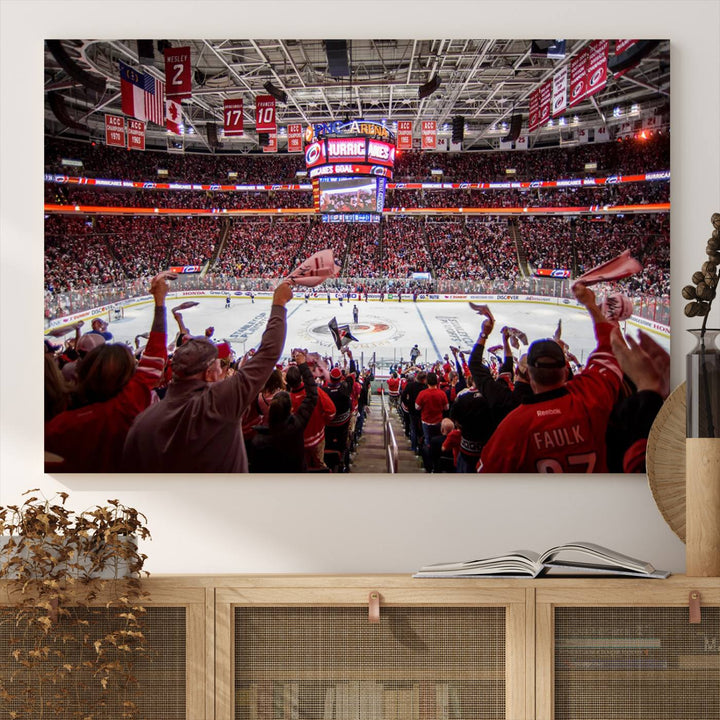 A museum-quality canvas print captures the excitement of hockey enthusiasts cheering in a bustling arena. This artwork provides a vibrant depiction of the Carolina Hurricanes Ice Hockey Stadium.