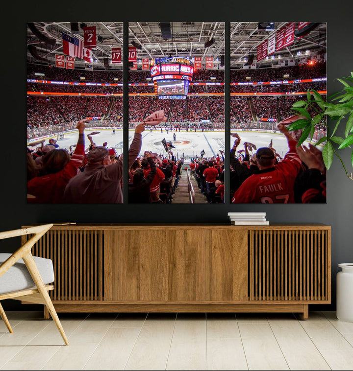 A museum-quality canvas print captures the excitement of hockey enthusiasts cheering in a bustling arena. This artwork provides a vibrant depiction of the Carolina Hurricanes Ice Hockey Stadium.