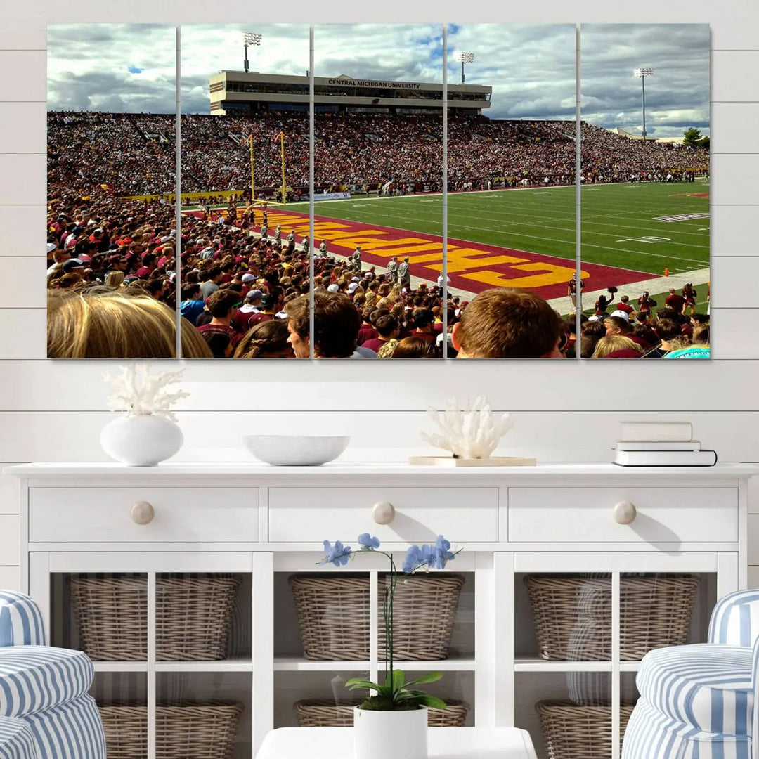 Hanging in the living room is the "Central Michigan University Chippewas Football Team Print," a gallery-quality canvas that features Mount Pleasant's Kelly/Shorts Stadium.