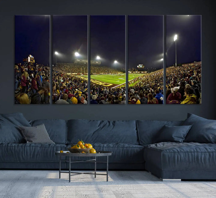 Experience the vibrant energy of a crowded football night under the bright lights of Kelly/Shorts Stadium, captured in our "Central Michigan University Chippewas Football Team Print - Mount Pleasant Kelly/Shorts Stadium Wall Art Canvas Print." This triple canvas wall art encapsulates excitement in every corner.