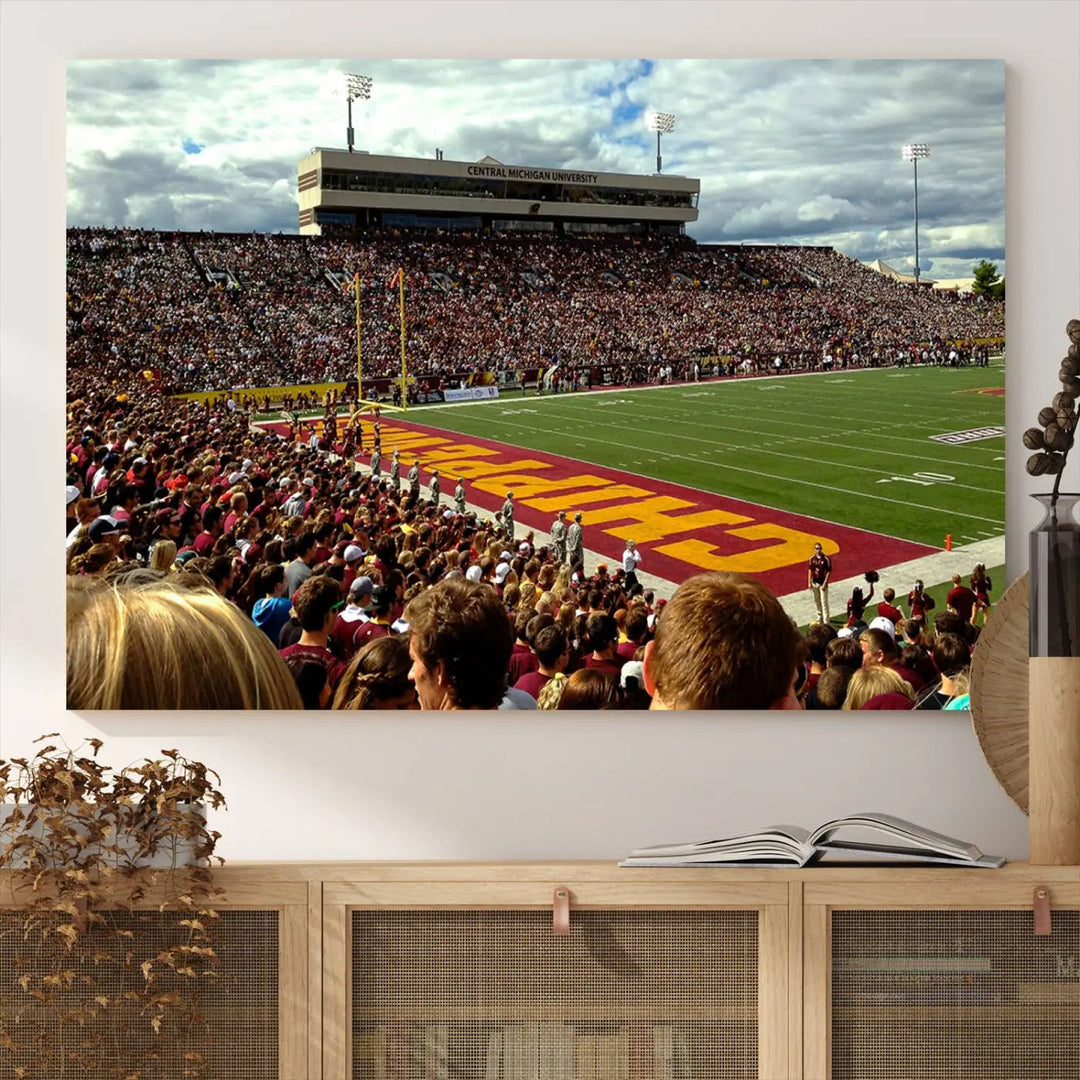 Hanging in the living room is the "Central Michigan University Chippewas Football Team Print," a gallery-quality canvas that features Mount Pleasant's Kelly/Shorts Stadium.