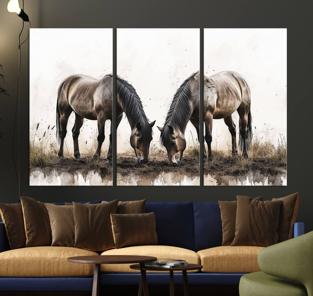 A Chinese Ink Style Horses Wall Art Canvas Print featuring two horses grazing is displayed in a modern setting.