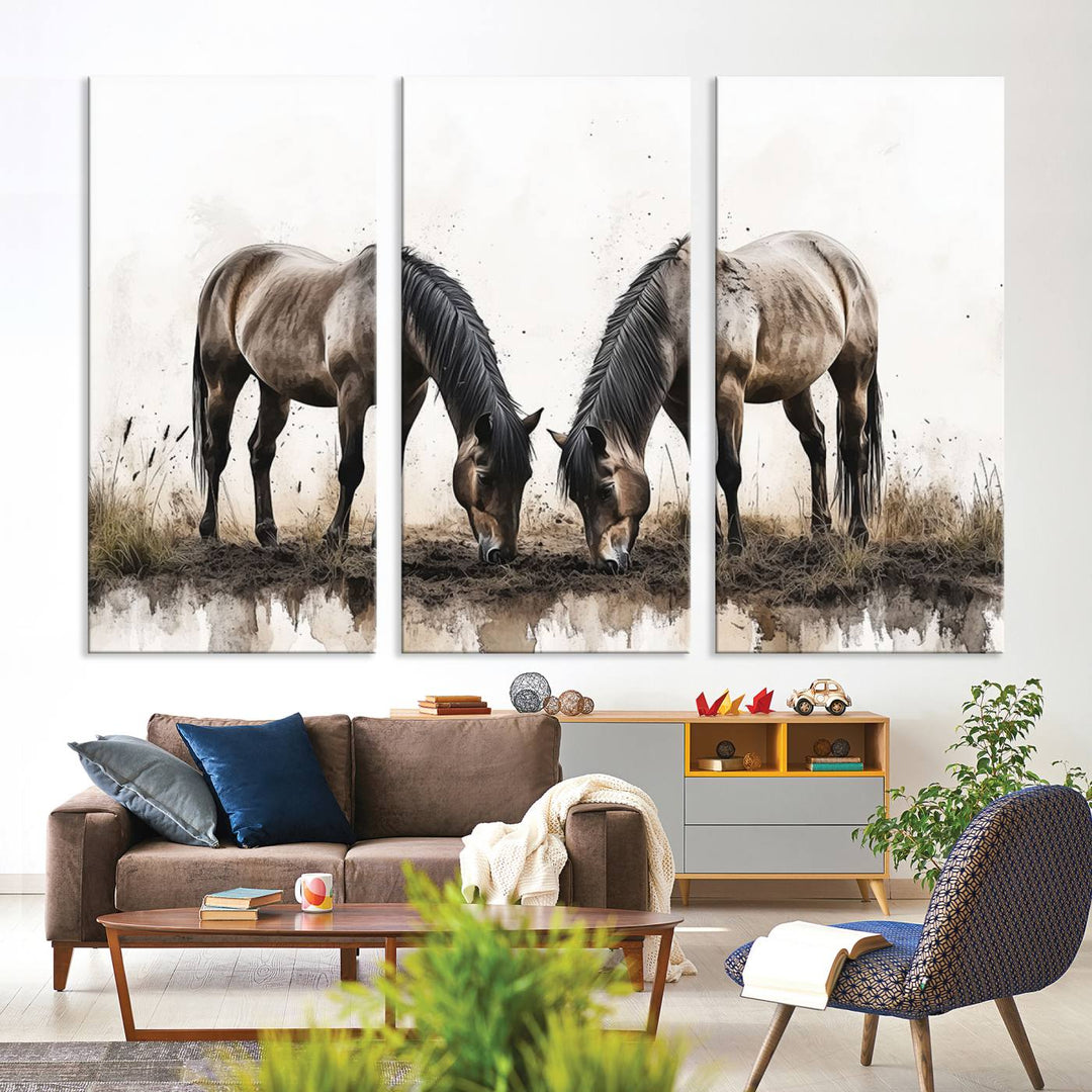 A Chinese Ink Style Horses Wall Art Canvas Print featuring two horses grazing is displayed in a modern setting.