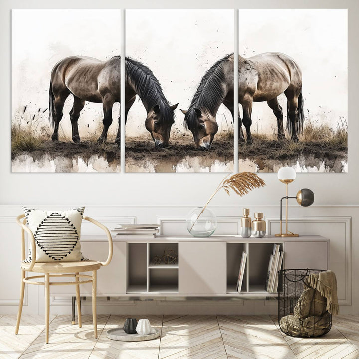 A Chinese Ink Style Horses Wall Art Canvas Print featuring two horses grazing is displayed in a modern setting.