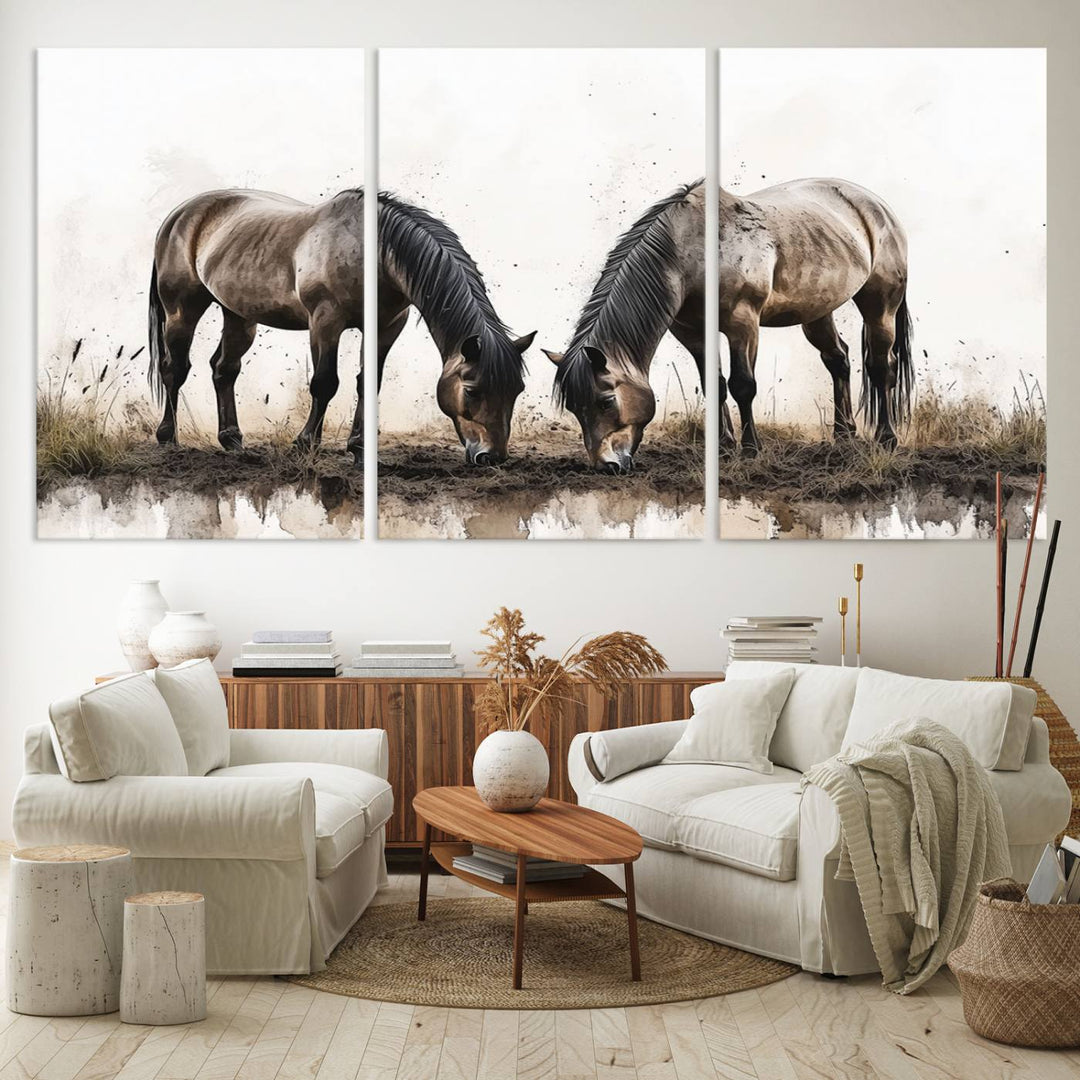 A Chinese Ink Style Horses Wall Art Canvas Print featuring two horses grazing is displayed in a modern setting.