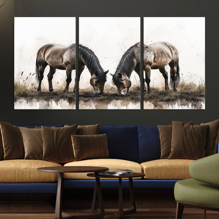 A Chinese Ink Style Horses Wall Art Canvas Print featuring two horses grazing is displayed in a modern setting.