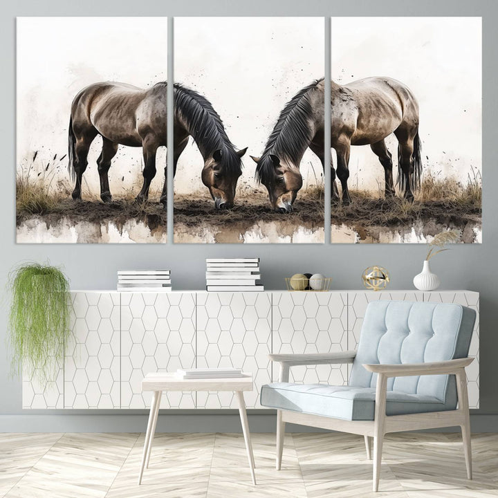 A Chinese Ink Style Horses Wall Art Canvas Print featuring two horses grazing is displayed in a modern setting.