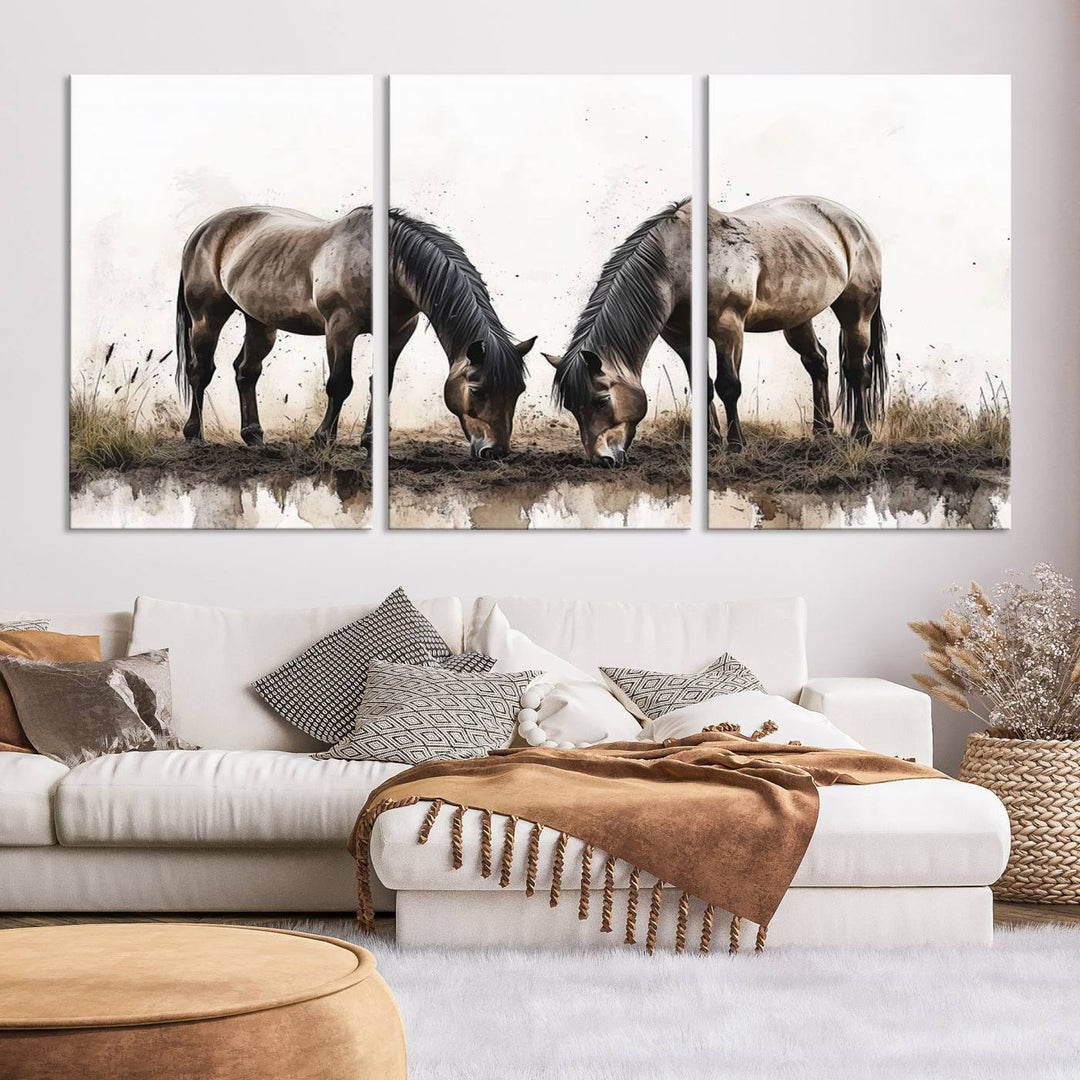 A Chinese Ink Style Horses Wall Art Canvas Print featuring two horses grazing is displayed in a modern setting.