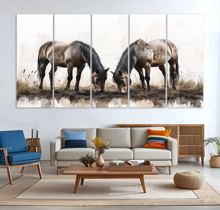 A Chinese Ink Style Horses Wall Art Canvas Print featuring two horses grazing is displayed in a modern setting.