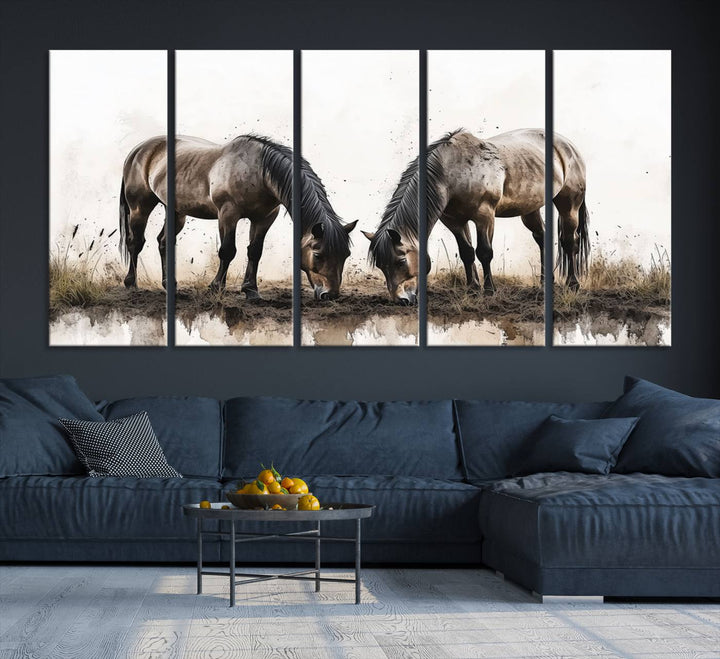 A Chinese Ink Style Horses Wall Art Canvas Print featuring two horses grazing is displayed in a modern setting.