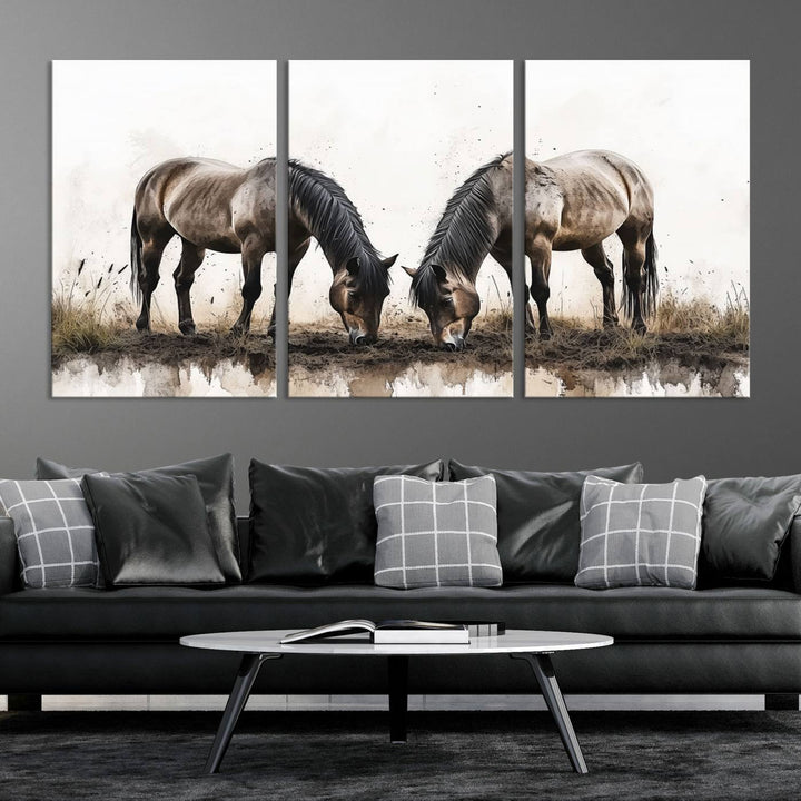 A Chinese Ink Style Horses Wall Art Canvas Print featuring two horses grazing is displayed in a modern setting.