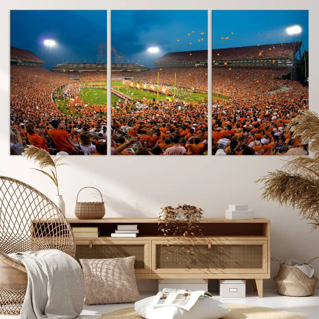 Imagine a stunning wall art canvas that captures the excitement and energy of a large football stadium packed with fans donned in orange. This Clemson University Tigers Football Team Print showcases Clemson Memorial Stadium under vibrant lights, transforming history into an enduring masterpiece.