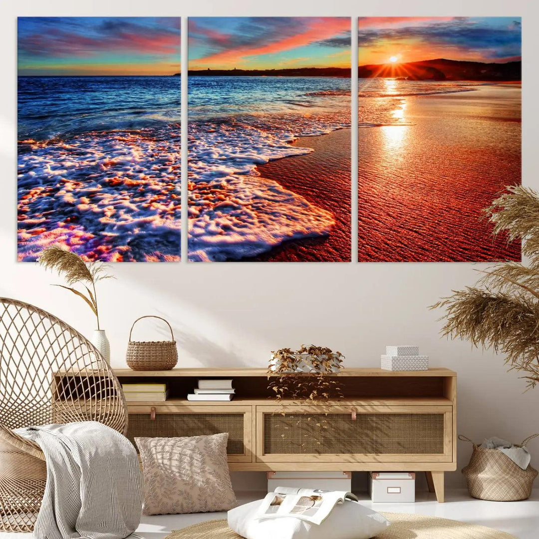 A captivating multi-panel seascape wall art showcases the Colorful Coastal Sunset on the Beach Canvas Print, depicting ocean waves crashing at dusk.