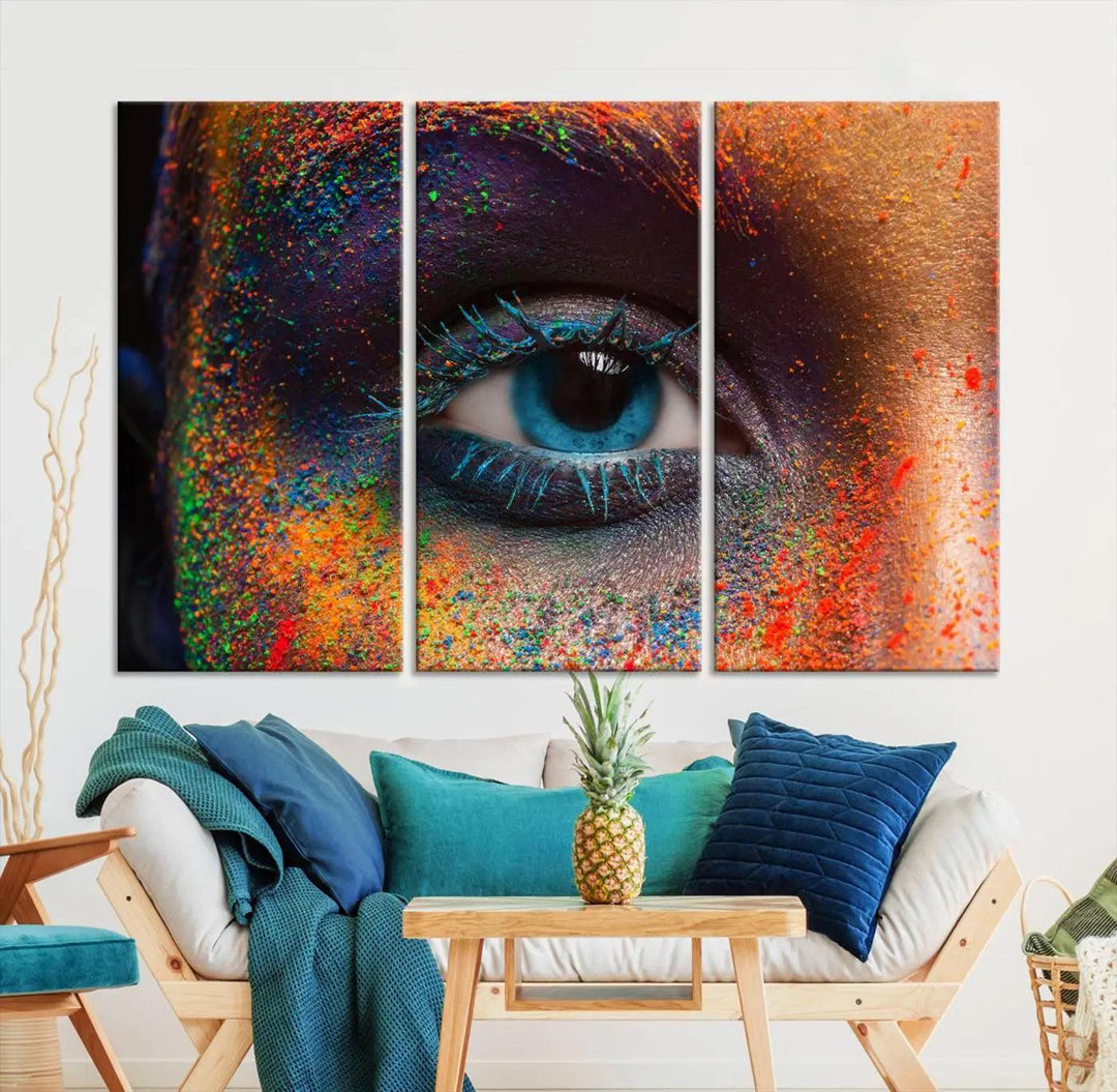 The contemporary living room is enhanced by a multi-panel canvas wall art piece titled "Colorful Eye Close Up Canvas Wall Art Print," which adds a vibrant touch to the gallery-wrapped design on the wall.