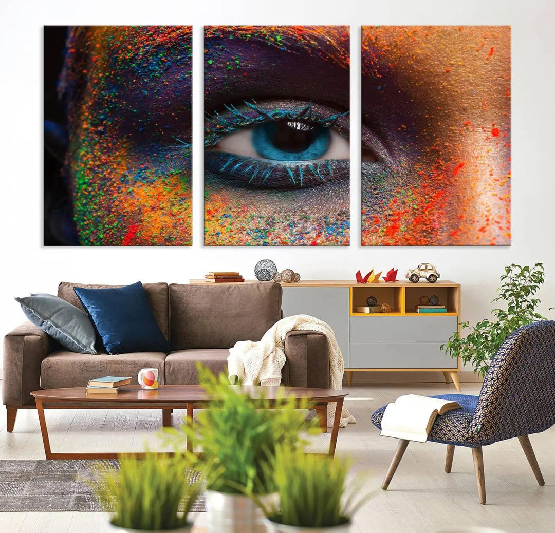 The contemporary living room is enhanced by a multi-panel canvas wall art piece titled "Colorful Eye Close Up Canvas Wall Art Print," which adds a vibrant touch to the gallery-wrapped design on the wall.