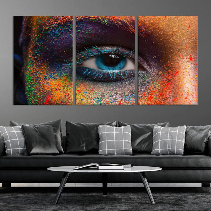 The contemporary living room is enhanced by a multi-panel canvas wall art piece titled "Colorful Eye Close Up Canvas Wall Art Print," which adds a vibrant touch to the gallery-wrapped design on the wall.