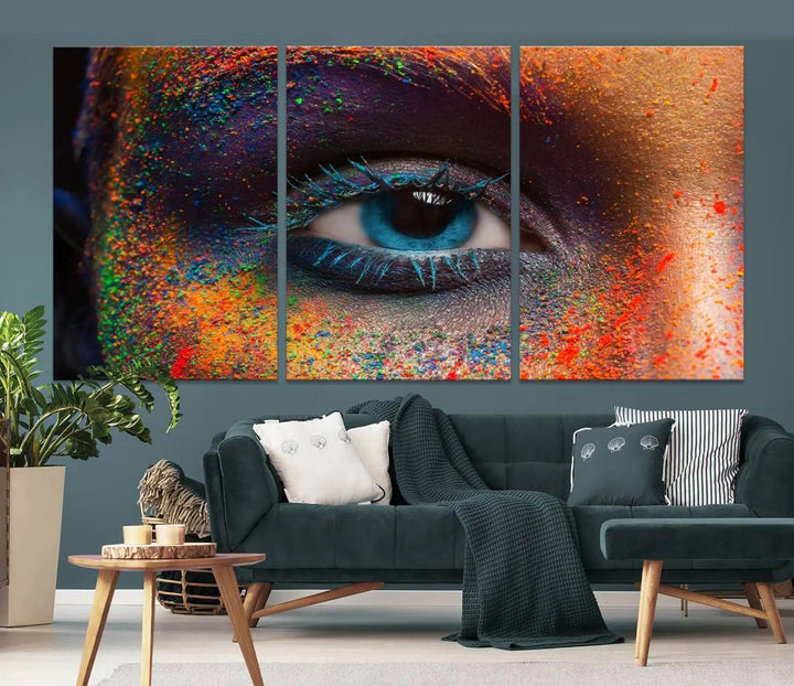 The contemporary living room is enhanced by a multi-panel canvas wall art piece titled "Colorful Eye Close Up Canvas Wall Art Print," which adds a vibrant touch to the gallery-wrapped design on the wall.