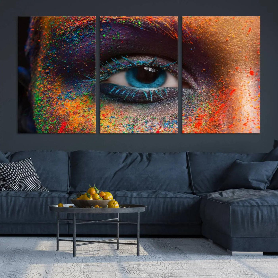 The contemporary living room is enhanced by a multi-panel canvas wall art piece titled "Colorful Eye Close Up Canvas Wall Art Print," which adds a vibrant touch to the gallery-wrapped design on the wall.