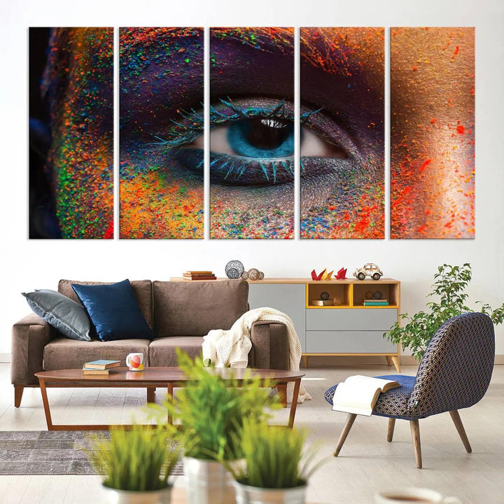 The contemporary living room is enhanced by a multi-panel canvas wall art piece titled "Colorful Eye Close Up Canvas Wall Art Print," which adds a vibrant touch to the gallery-wrapped design on the wall.