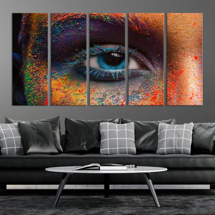 The contemporary living room is enhanced by a multi-panel canvas wall art piece titled "Colorful Eye Close Up Canvas Wall Art Print," which adds a vibrant touch to the gallery-wrapped design on the wall.