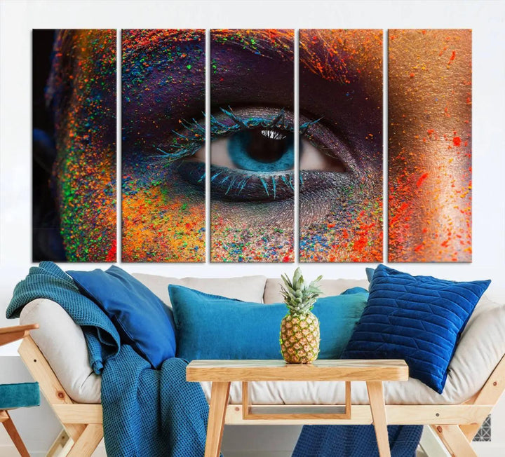 The contemporary living room is enhanced by a multi-panel canvas wall art piece titled "Colorful Eye Close Up Canvas Wall Art Print," which adds a vibrant touch to the gallery-wrapped design on the wall.