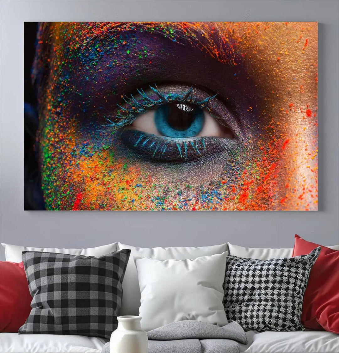 The contemporary living room is enhanced by a multi-panel canvas wall art piece titled "Colorful Eye Close Up Canvas Wall Art Print," which adds a vibrant touch to the gallery-wrapped design on the wall.