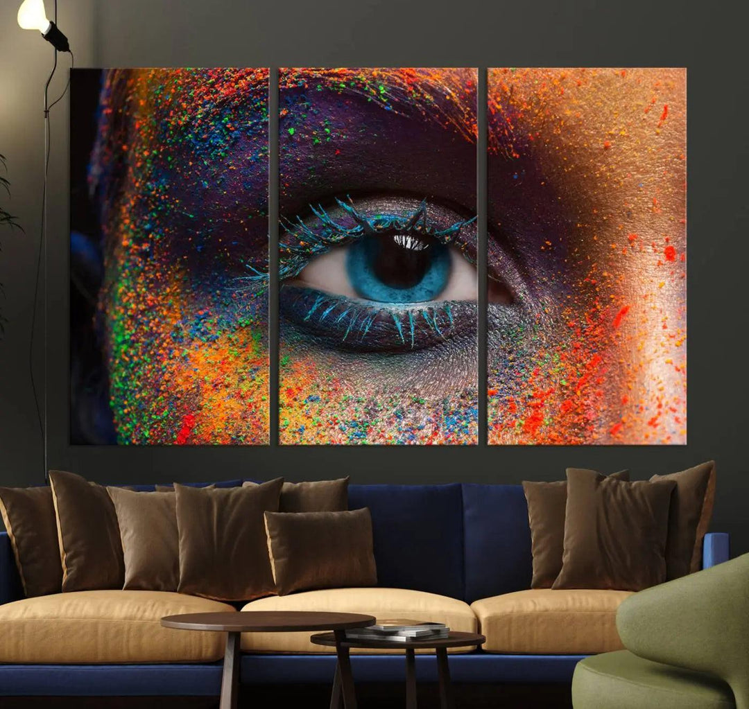 The contemporary living room is enhanced by a multi-panel canvas wall art piece titled "Colorful Eye Close Up Canvas Wall Art Print," which adds a vibrant touch to the gallery-wrapped design on the wall.