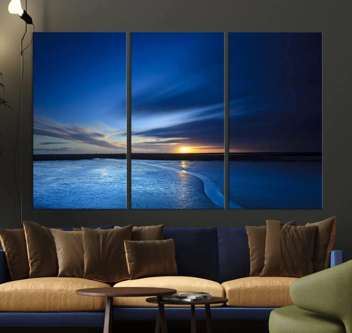 Deep blue ocean sunset triptych canvas art featuring a serene coastal sunset. Ideal for modern interiors. High-quality giclee canvas print.