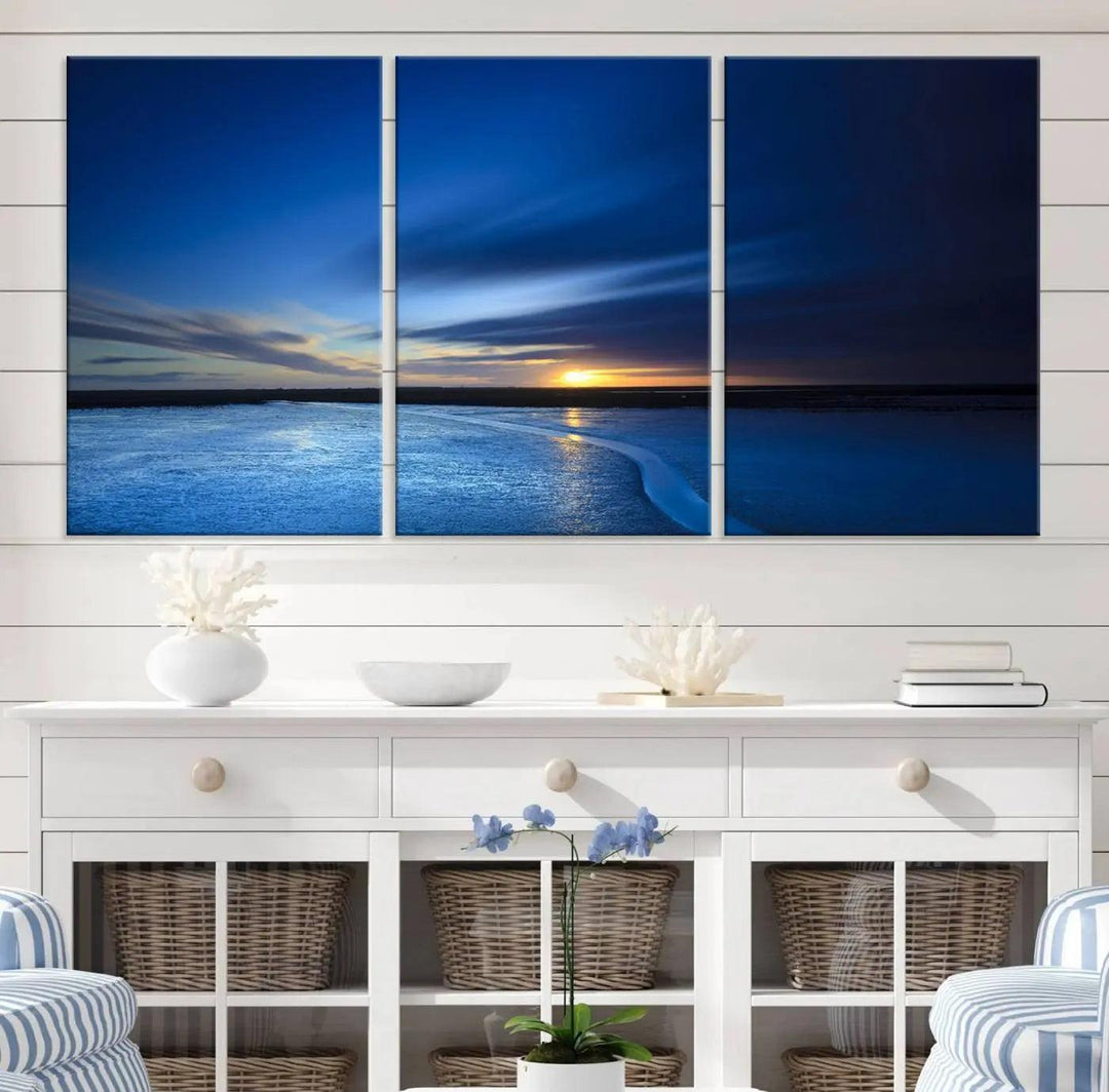 Deep blue ocean sunset triptych canvas art featuring a serene coastal sunset. Ideal for modern interiors. High-quality giclee canvas print.