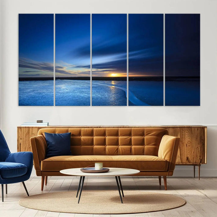 Deep blue ocean sunset triptych canvas art featuring a serene coastal sunset. Ideal for modern interiors. High-quality giclee canvas print.