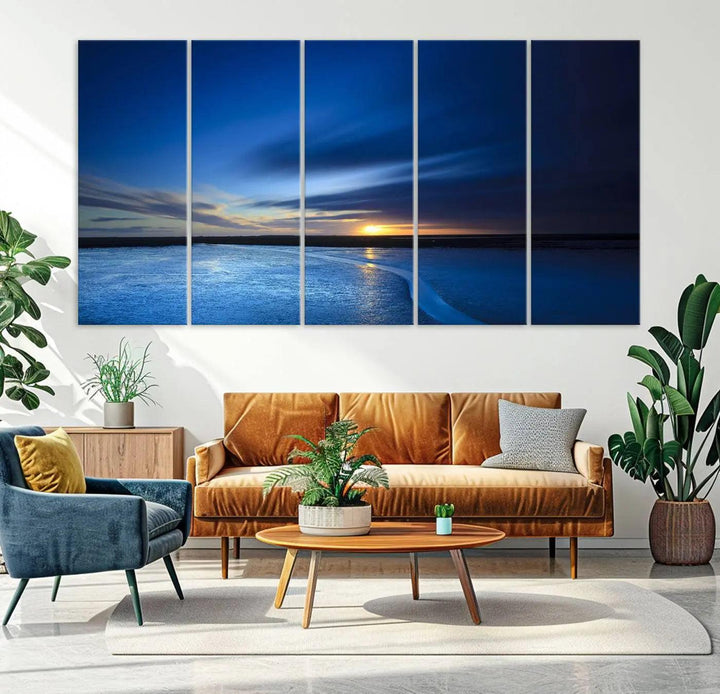 Deep blue ocean sunset triptych canvas art featuring a serene coastal sunset. Ideal for modern interiors. High-quality giclee canvas print.