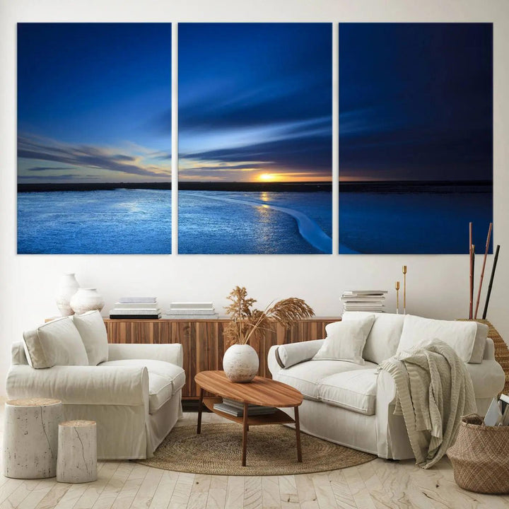 Deep blue ocean sunset triptych canvas art featuring a serene coastal sunset. Ideal for modern interiors. High-quality giclee canvas print.