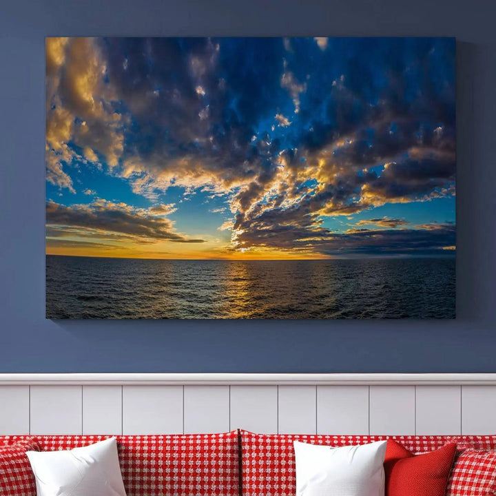 The Dramatic Ocean Sunset Canvas Art, a panoramic seascape wall art crafted using Canon-quality giclee canvas printing, beautifully captures a tranquil ocean view beneath dramatic clouds.