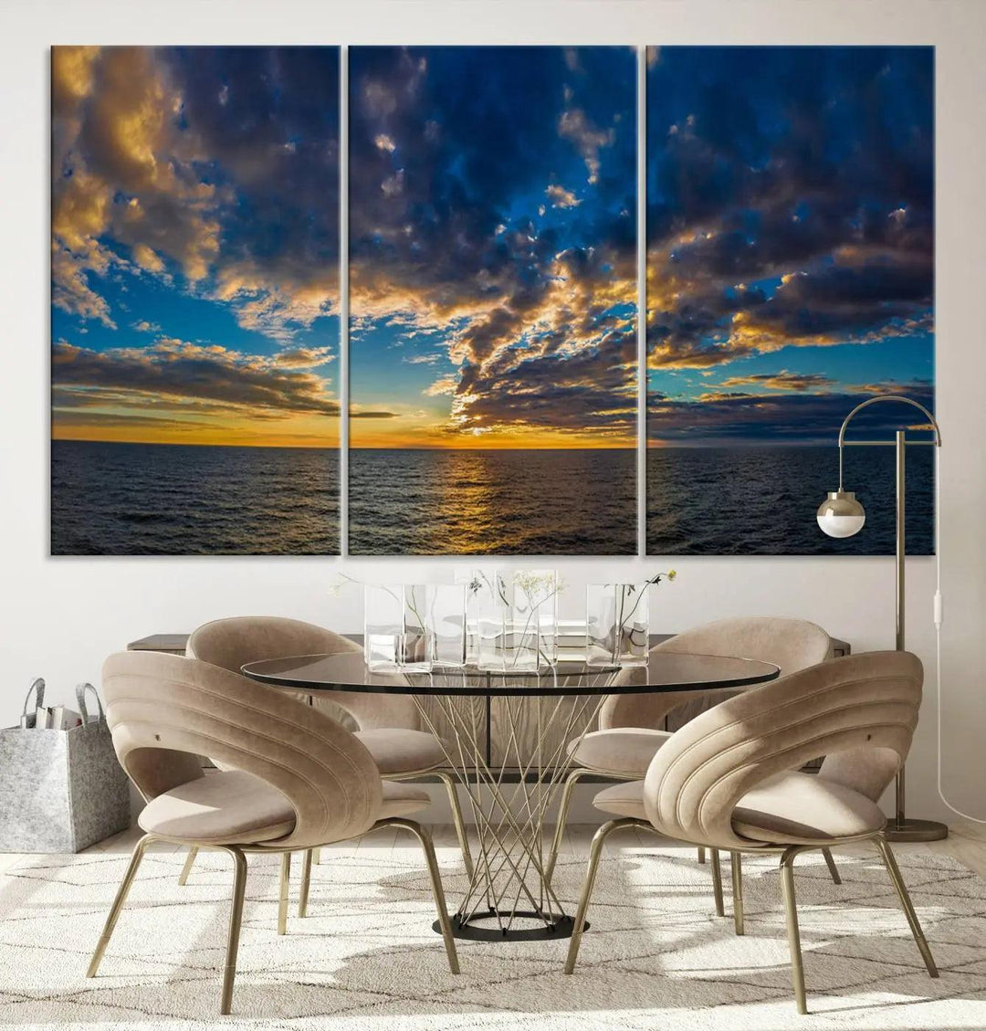 The Dramatic Ocean Sunset Canvas Art, a panoramic seascape wall art crafted using Canon-quality giclee canvas printing, beautifully captures a tranquil ocean view beneath dramatic clouds.