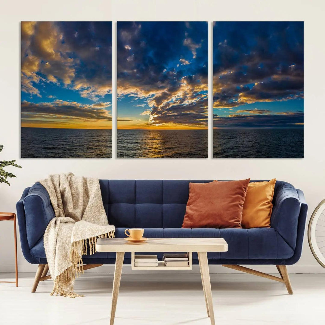 The Dramatic Ocean Sunset Canvas Art, a panoramic seascape wall art crafted using Canon-quality giclee canvas printing, beautifully captures a tranquil ocean view beneath dramatic clouds.