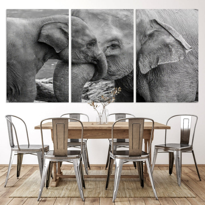 The Elephant Family Wall Art Canvas Print, depicting a black and white triptych of elephants embracing, is a museum-quality piece meticulously hand-assembled into framed art. This elegant canvas combines sophistication with the convenience of free shipping.