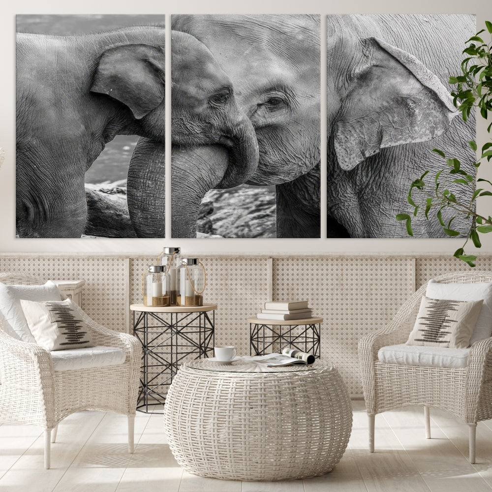 The Elephant Family Wall Art Canvas Print, depicting a black and white triptych of elephants embracing, is a museum-quality piece meticulously hand-assembled into framed art. This elegant canvas combines sophistication with the convenience of free shipping.