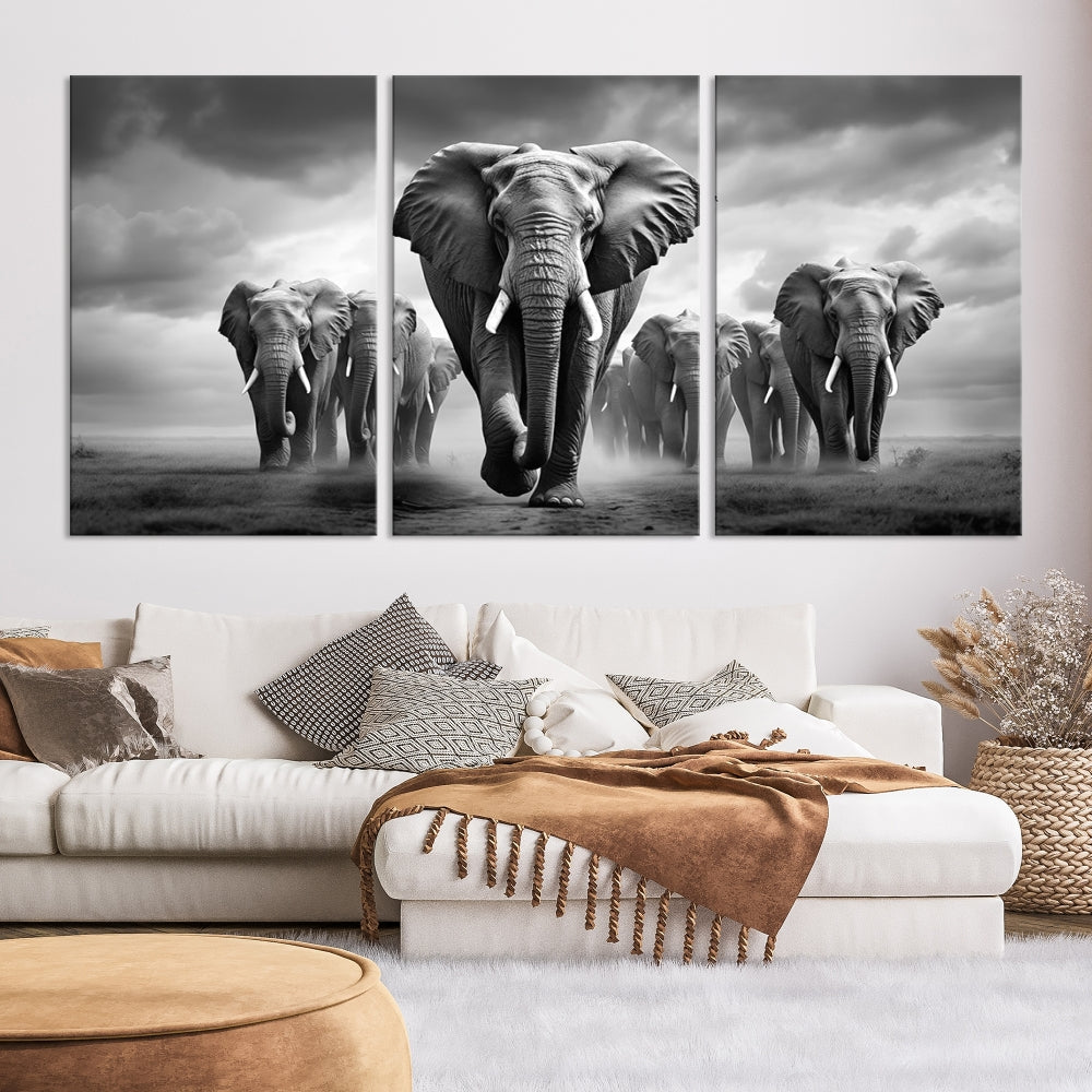 The Elephant Family Wall Art Canvas Print is displayed as a triptych. Each piece is gallery-wrapped on museum-quality canvases for an elegant finish.