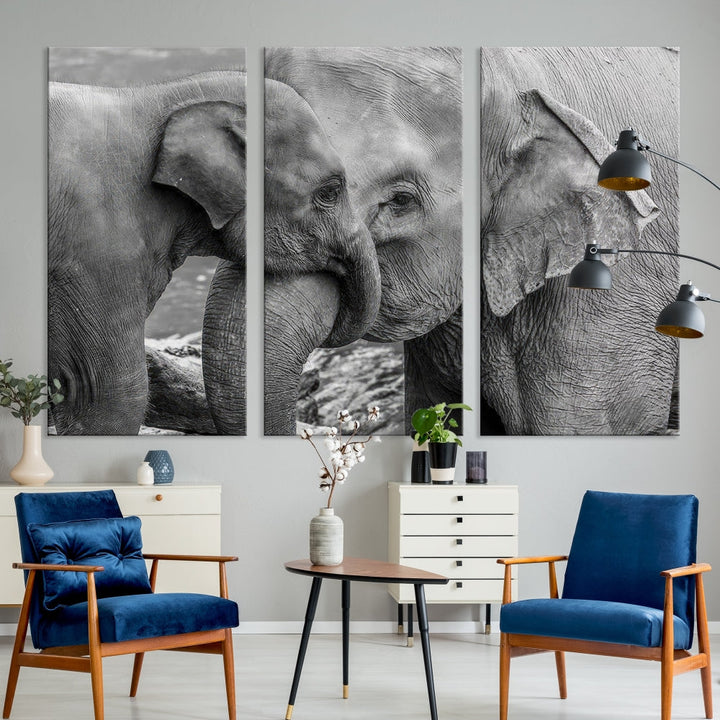 The Elephant Family Wall Art Canvas Print, depicting a black and white triptych of elephants embracing, is a museum-quality piece meticulously hand-assembled into framed art. This elegant canvas combines sophistication with the convenience of free shipping.