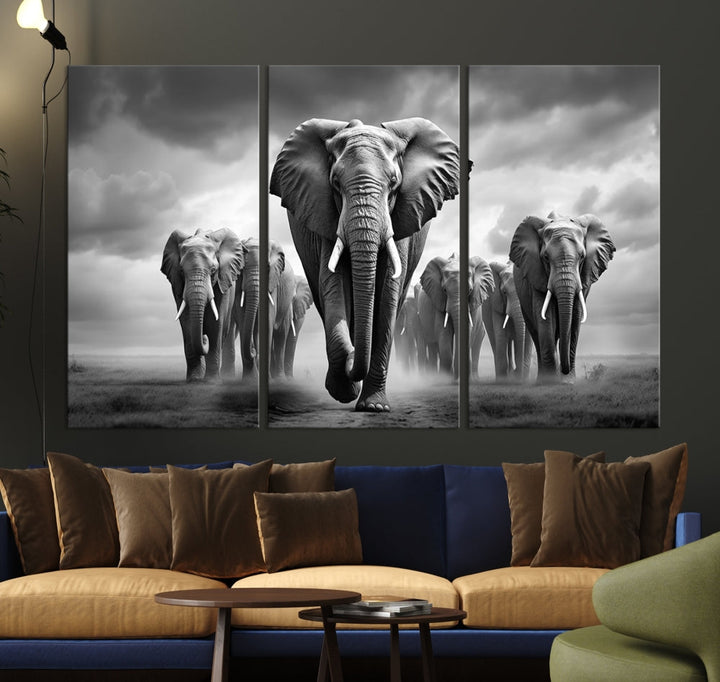 The Elephant Family Wall Art Canvas Print is displayed as a triptych. Each piece is gallery-wrapped on museum-quality canvases for an elegant finish.