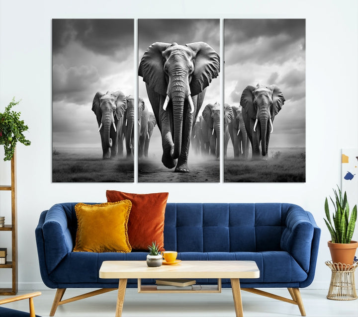 The Elephant Family Wall Art Canvas Print is displayed as a triptych. Each piece is gallery-wrapped on museum-quality canvases for an elegant finish.