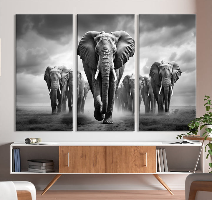 The Elephant Family Wall Art Canvas Print is displayed as a triptych. Each piece is gallery-wrapped on museum-quality canvases for an elegant finish.