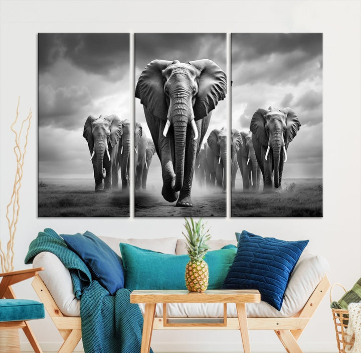 The Elephant Family Wall Art Canvas Print is displayed as a triptych. Each piece is gallery-wrapped on museum-quality canvases for an elegant finish.