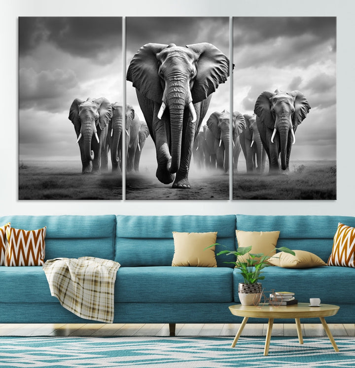 The Elephant Family Wall Art Canvas Print is displayed as a triptych. Each piece is gallery-wrapped on museum-quality canvases for an elegant finish.