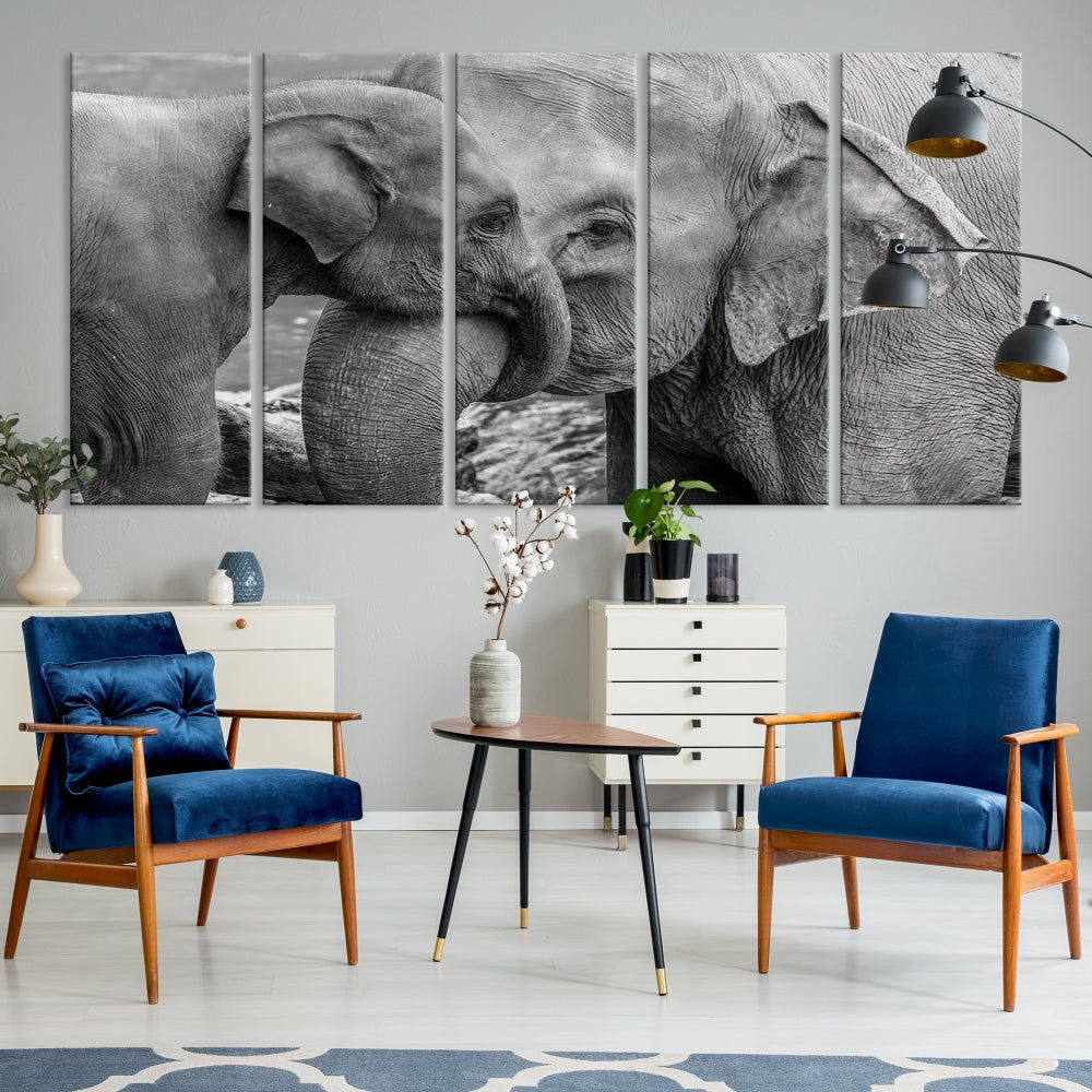 The Elephant Family Wall Art Canvas Print, depicting a black and white triptych of elephants embracing, is a museum-quality piece meticulously hand-assembled into framed art. This elegant canvas combines sophistication with the convenience of free shipping.