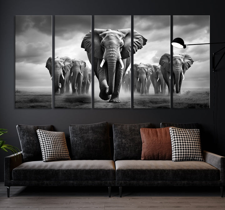 The Elephant Family Wall Art Canvas Print is displayed as a triptych. Each piece is gallery-wrapped on museum-quality canvases for an elegant finish.