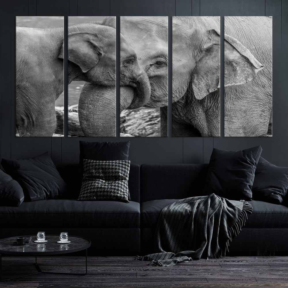 The Elephant Family Wall Art Canvas Print, depicting a black and white triptych of elephants embracing, is a museum-quality piece meticulously hand-assembled into framed art. This elegant canvas combines sophistication with the convenience of free shipping.