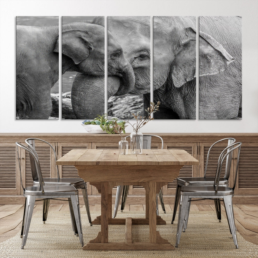 The Elephant Family Wall Art Canvas Print, depicting a black and white triptych of elephants embracing, is a museum-quality piece meticulously hand-assembled into framed art. This elegant canvas combines sophistication with the convenience of free shipping.