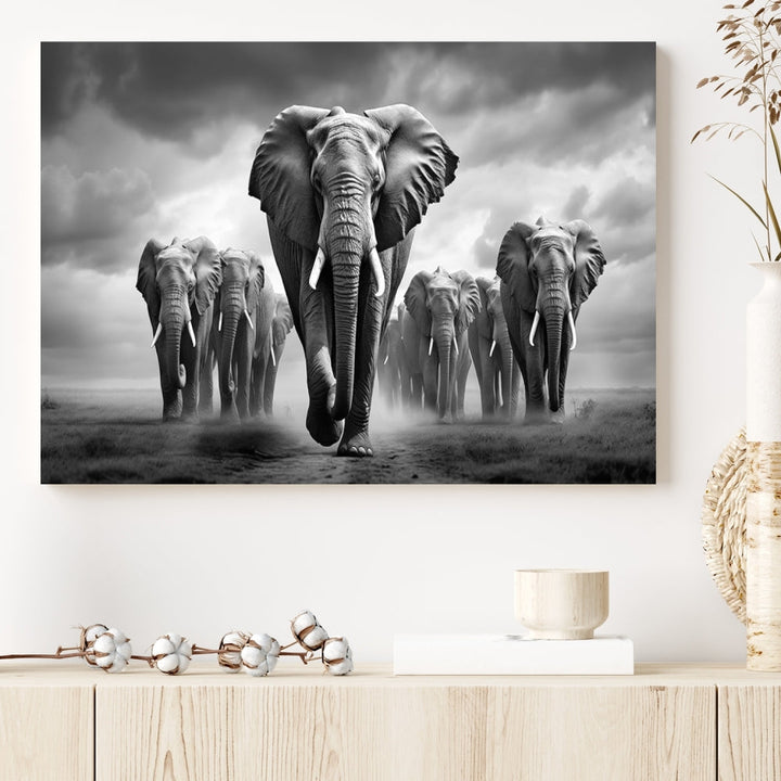 The Elephant Family Wall Art Canvas Print is displayed as a triptych. Each piece is gallery-wrapped on museum-quality canvases for an elegant finish.